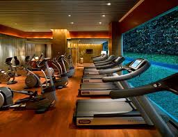 The Sleek Fitness Centre At The Grand Hyatt Singapore Features Kinesis Stations And Personal Trainers On Standby For Safe Ac Luxury Gym Gym Decor Gym Interior