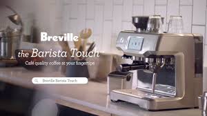 Now open the handle completely and load a coffee capsule. Breville Barista Touch Bes880bss Espresso Machine Espresso Planet Canada