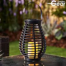 Lamplust outdoor black solar candle lanterns. Garden Gear Flickering Candle Rattan Solar Lantern Thompson Morgan