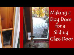 Wood looks great, but costs the most and is harder to maintain. Making A Dog Door For The Sliding Glass Door Youtube