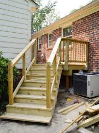 Preparing to install deck stair railings. How To Build A Deck It S Done Young House Love