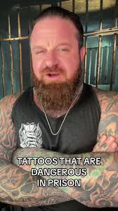 Guillotine Tattoos Instead of Crosses