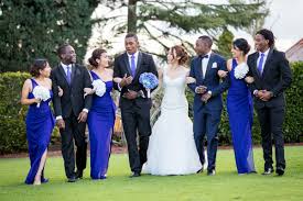 Black And Blue Wedding Example Of Groom In Blue And Groomsmen In Black With Royal Blue Ties And Bridesma Horizon Blue Weddings Royal Blue Wedding Theme Royal Blue Bridesmaid Dresses