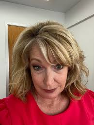 It's hot and humid outside and that means my summer frizz and curly q's are  here! For a long time, women in the news business were told that curly hair  didn't look