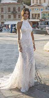 The epitome of minimalism, this sleek dress features a delicate halter neck with a tied open back. 51 Beach Wedding Dresses Perfect For Destination Weddings Svadobne Saty Saty A Svadba