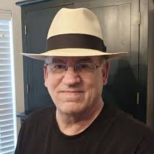 The animal depicted is a Dimetrodon, a prehistoric synapsid that lived  during the Permian period, approximately 298 to 272 million years ago.  While often mistaken for a dinosaur, Dimetrodon is more closely