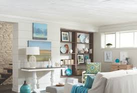 In this attic space, the patterned wallpaper creates a feature at the rear of the room, letting the sloping white ceiling recede into the background. Low Ceiling Solutions Ceilings Armstrong Residential