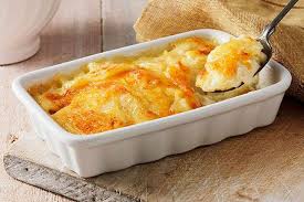 Meet Your New Favorite Cheesy Potatoes Au Gratin The Evaporated Milk And Sharp Cheddar Make It Extra Deluxe Cr Potatoes Au Gratin Cheesy Potatoes Kraft Recipes
