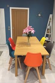 Eiffel Inspired Plastic Dining Chair With Squared Light Wood Legs Dining Room Colors Colorful Dining Room Chairs Dinning Room Chairs