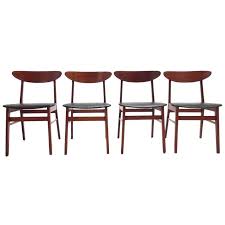 Danish Farstrup Teak And Black Vinyl Set Of Four Dining Chairs Midcentury 1stdibs Com Antique Dining Room Chairs Dining Room Chairs Dining Chairs