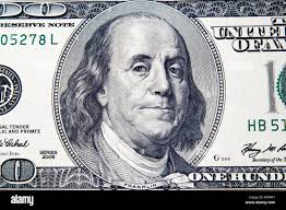 Macro shot of a 100 dollar Stock Photo