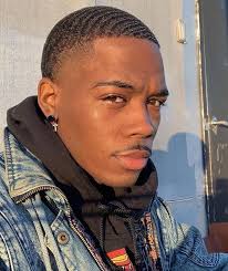 Many black men and boys wear the spinning waves low hair cut; Top 30 Cool African American Hairstyles Best Haircuts For Black Men
