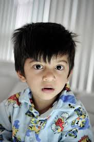 Photographing a shy boy with portrait lens