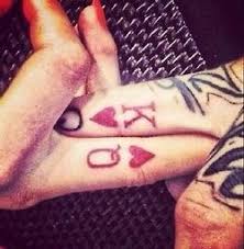 This is a finely detailed tattoo of a king and queen found on playing cards. Thus Is Perfect King Queen Of Hearts Tattoo Finger Tattoos At Repinned Net