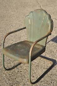 They were old when i got right chair is pre ww2 durham vintage metal lawn chair. Art Deco Steel Metal Clam Shell Back Green Patio Bouncer Lounge Chairs A Pair At 1stdibs