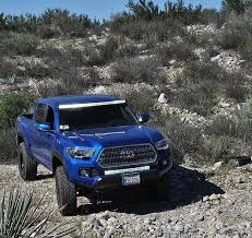 16 Toyota Tacoma 3 Lift 33 Tires Light Bars Cali Raised Led Toyota Trucks Toyota Tacoma 4x4 Toyota Tacoma