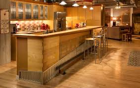 Add a metal countertop for an extra touch of modern style! Kitchen Island Of A Downtown Loft Redesigned As An Intriguing Bar Silent Rivers Design Build Custom Homes Remodeling Des Moines