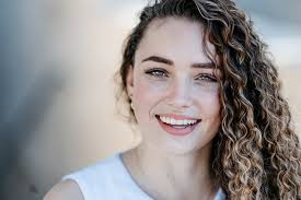 Meet Danielle! 👋 Born and raised in the Cayman Islands, Danielle has  called our gem of the Caribbean home for her entire life. One of her  favorite things about growing up on