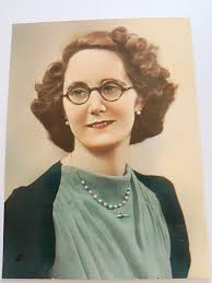 My mother in 1937 The handbag has a Gold RAF Badge