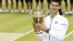 Novak djokovic of serbia holds the trophy after winning the men's singles final against roger federer of switzerland at wimbledon. Wimbledon 2015 Men S Final Novak Djokovic Beats Roger Federer Live Bbc Sport