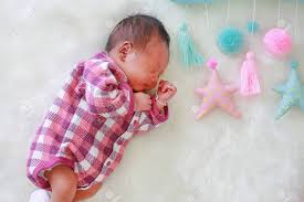 Sweet Dreams Newborn Baby Boy Sleeping On White Fur Background With Soft Fabric Mobile Stock Photo Picture And Royalty Free Image Image 122376918