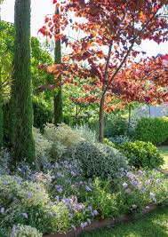 An Adelaide Garden With Something For All Seasons In 2020 Hillside Garden How To Start Composting Plants
