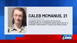 Man charged after 11 firearms found