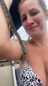 What is the species of the white snake with black spots found in Montana?