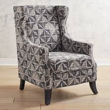 Centuries Ago The Wingback Chair Was Born Of A Need To Keep Warm Insulated And Protected From Drafts Now Throu Blue Wing Chair Blue Accent Chairs Wing Chair