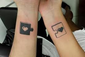 Black and grey puzzle hand tattoo. 1001 Ideas For Couples Siblings And Friends Matching Tattoos