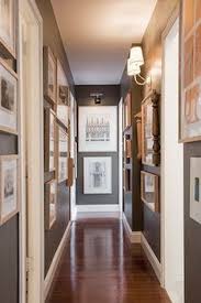 This is one of the more modern entrance hall decorating ideas and it really will give your home an updated feel. Narrow Hallway Decorating Narrow Hallway Decorating Hallway Decorating Hallway Designs