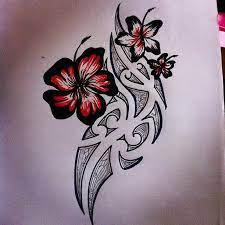 The purple flowers tucked on to the black vine present a pleasing picture that symbolizes bliss. I M Not One For Flower Tattoos But I Love The Way These Flowers Look Http Www Pinterest Com Ah Tribal Tattoos For Women Tribal Tattoos Tribal Flower Tattoos