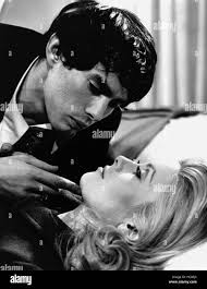 BELLE DE JOUR, Pierre Clementi (top), Catherine Deneuve, 1967 Stock Photo