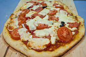 Bobby Flay Pizza Dough 110 Pounds And Counting Recipe Bobby Flay Pizza Dough Pizza Recipes Dough Food Network Recipes