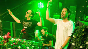 Electronic music lovers and fans all over the world know dimitri vegas thivaios as half of the monolithic brotherly duo dimitri vegas and like mike and as ambassador of the worldwide phenomenon, tomorrowland. Dimitri Vegas Like Mike And Vini Vici Join Forces On The Epic Get In Trouble So What