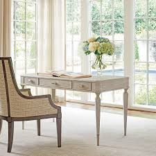 With a table like set up, and simple side chair, this desk collection provides useful and accommodating organizational space without taking up lots of space. Sligh Chloe French Country Grey Leather Surface Silver Leaf Wood Writing Desk Desk In Living Room Wood Writing Desk Writing Desk