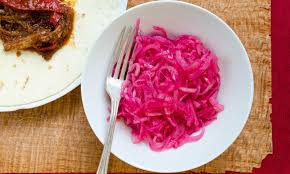 To make the tacos, heat the tortillas according to the package directions. Mexican Quick Pickled Red Onions