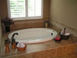 Ideas for using recycled and salvaged materials in your garden by laura beth love of. Before White Bathroom After Warm Color Jacuzzi Bathroom Bathroom Tile Designs Modern Bathroom Decor