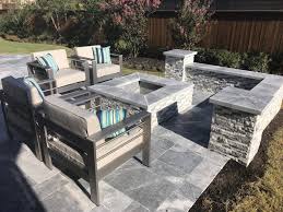 Curved stone walls create both privacy and extra seating. Gorgeous Patio Fire Pit Ideas Precision Pavers