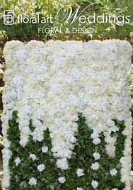 Flower Wall By Floral Art White Phalaenopsis Orchids White Roses And White Hydrangea For End Of Summer Wedd Flower Wall Wedding Flower Wall Decor Flower Wall