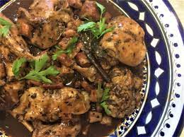 Maltese Rabbit Cooked In Wine And Garlic Maltese Recipes Rabbit Food Cooking