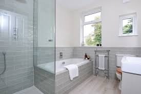 One has 3 glass shelves and two wooden shelves inside and the other one has 2 glass shelves and two wooden shelves inside. Southfields Sw18 Modern Bathroom London By Saville Construction London Ltd Houzz