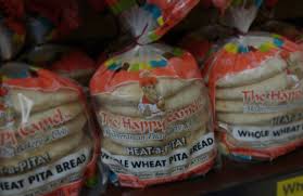The happy camel pita oven is 700 degrees and pitas bake in it while on a conveyor belt which allows for heat to surround them on both sides. Our Products The Happe Camel