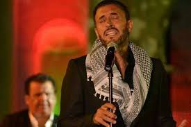 يغني تذكر كلما صليت ليلا ملايينا تلوك الصخر خبزا على جسر الجراح مشت وتمشي وتلبس جلدها وتموت عزا تذكر كلما تغفو على أي و Fictional Characters John Character