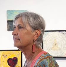 Applying multiple coats of Gamvar to paintings