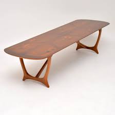 Walnut is one of nature's most luxurious materials. 1960 S Vintage Long Tom Coffee Table By Heal S Retrospective Interiors Retro Furniture Vintage Mid Century Furniture Vintage Danish Modern Furniture Antique Furniture London