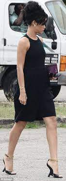 3.6 wavy hair middle part. Rihanna Teams Black Dress With A Beehive Hairstyle To Attend Her Grandmother Dolly S Barbados Funeral Funeral Attire Rihanna All Black Outfit