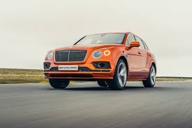 Green with blue leather interior. Bentley Bentayga Speed Review How Does The World S Fastest Suv Work On Track Evo