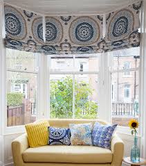 What's on your windows is often a bit ancillary, but shades and draperies should really be top of mind as your choice could affect the whole feel of your space. How To Dress A Bay Window Stylish Ways With Blinds Curtains Shutters