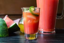 Slice the watermelon in half. Watermelon Rum Punch Recipe Hearth And Vine